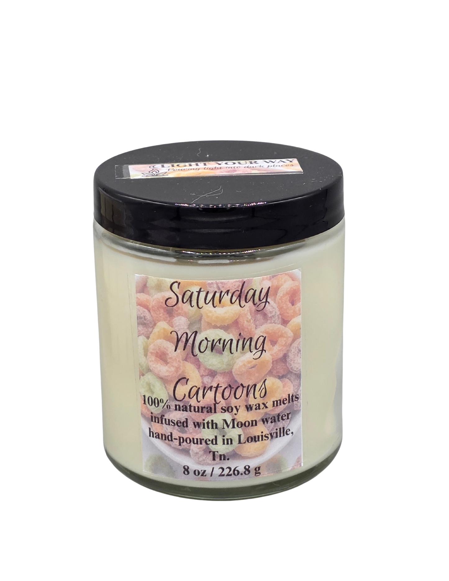 Candle jar labeled 'Saturday Morning Cartoons' with a black lid