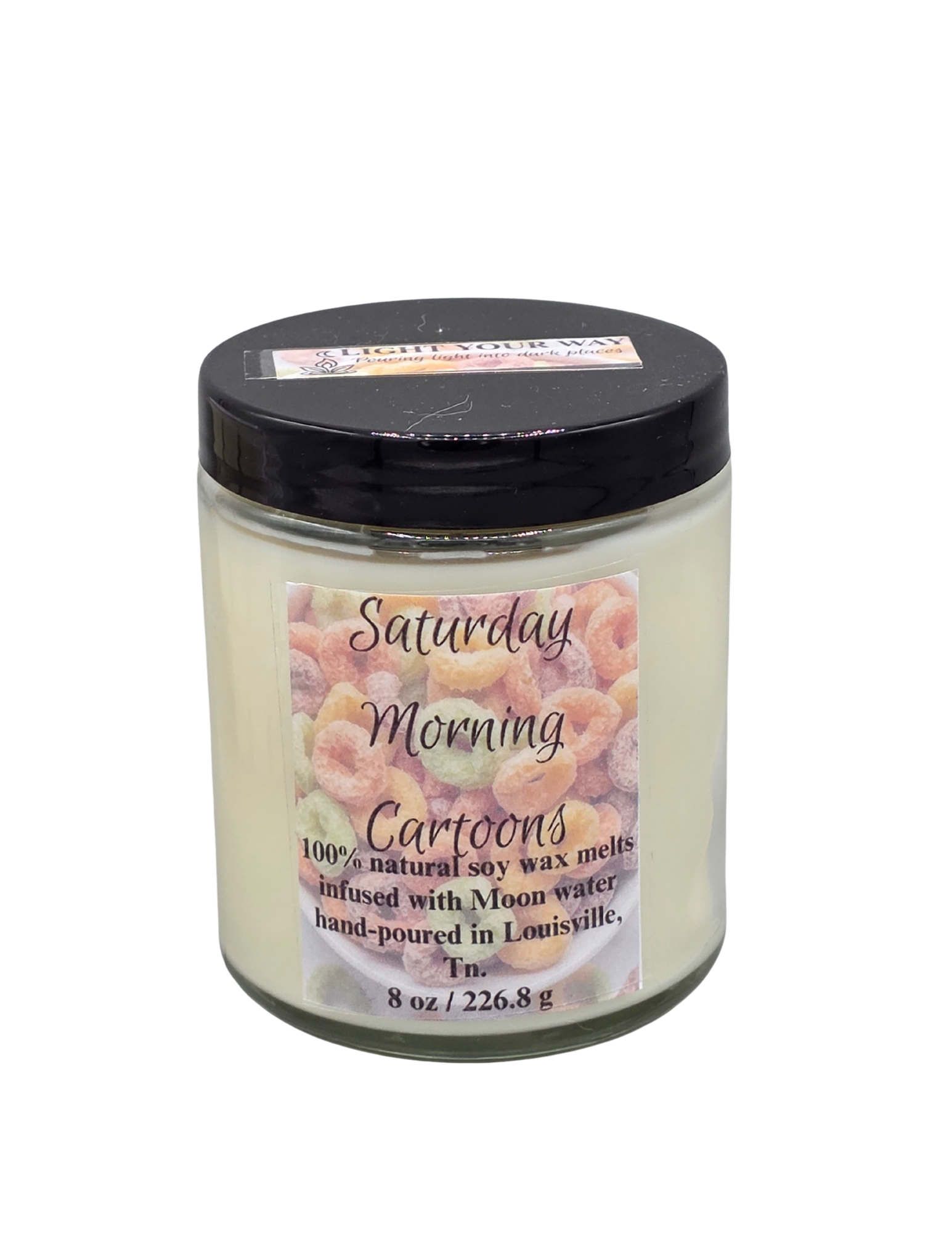 Candle jar labeled 'Saturday Morning Cartoons' with a black lid
