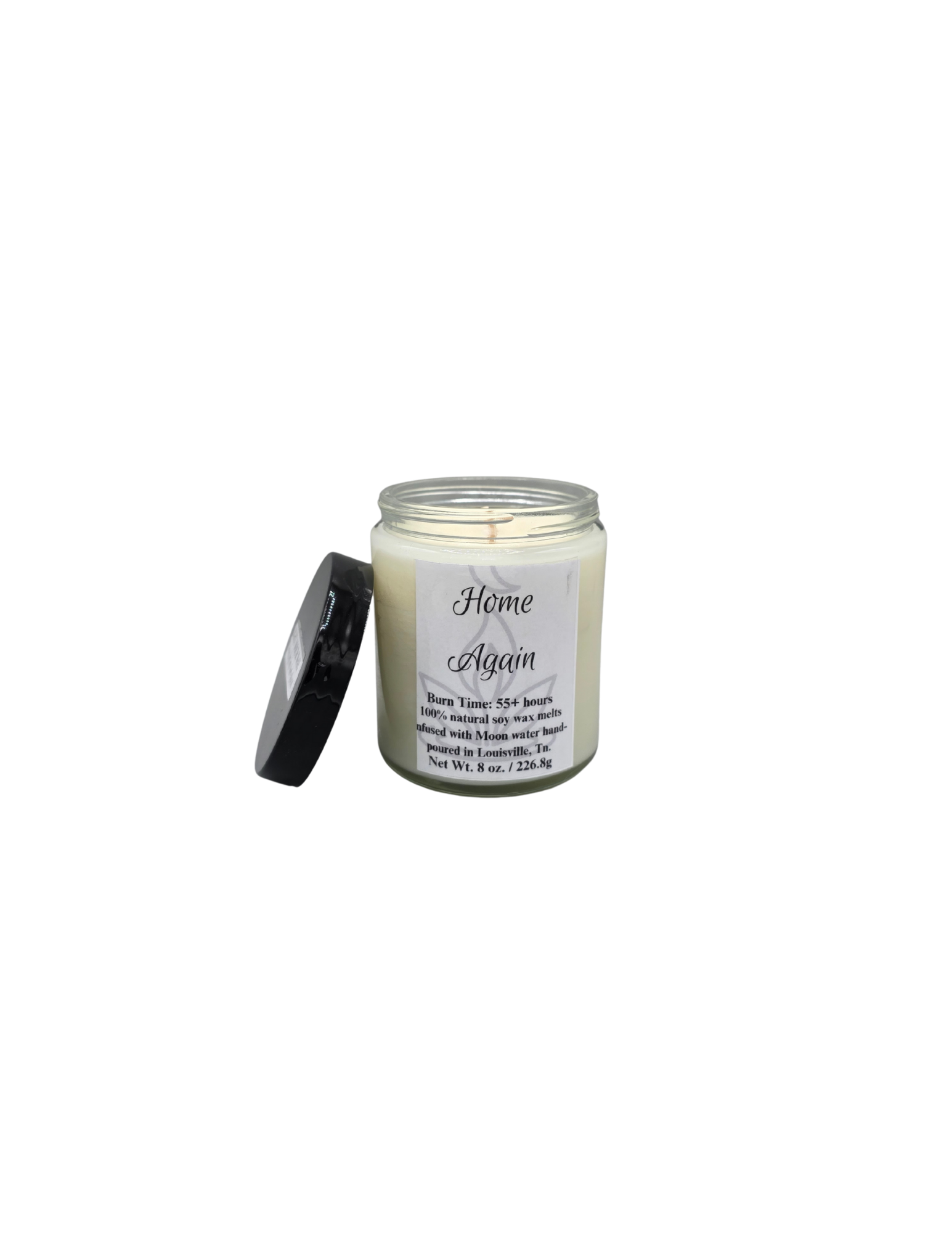 Candle jar labeled 'Home Again' on a white background with black lid