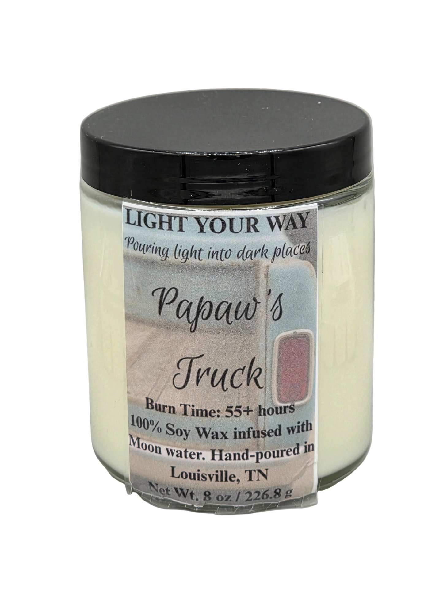 Candle with a label that says Papaw's Truck 