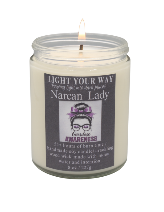 Candle in a jar with a label titled 'Narcan Lady' 