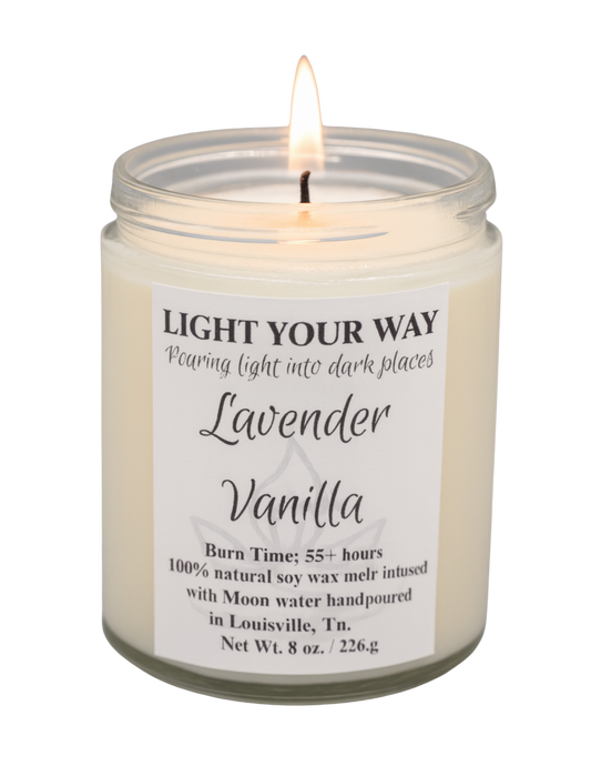 Lavender Vanilla candle in a glass jar with a label that has a flame on the wick