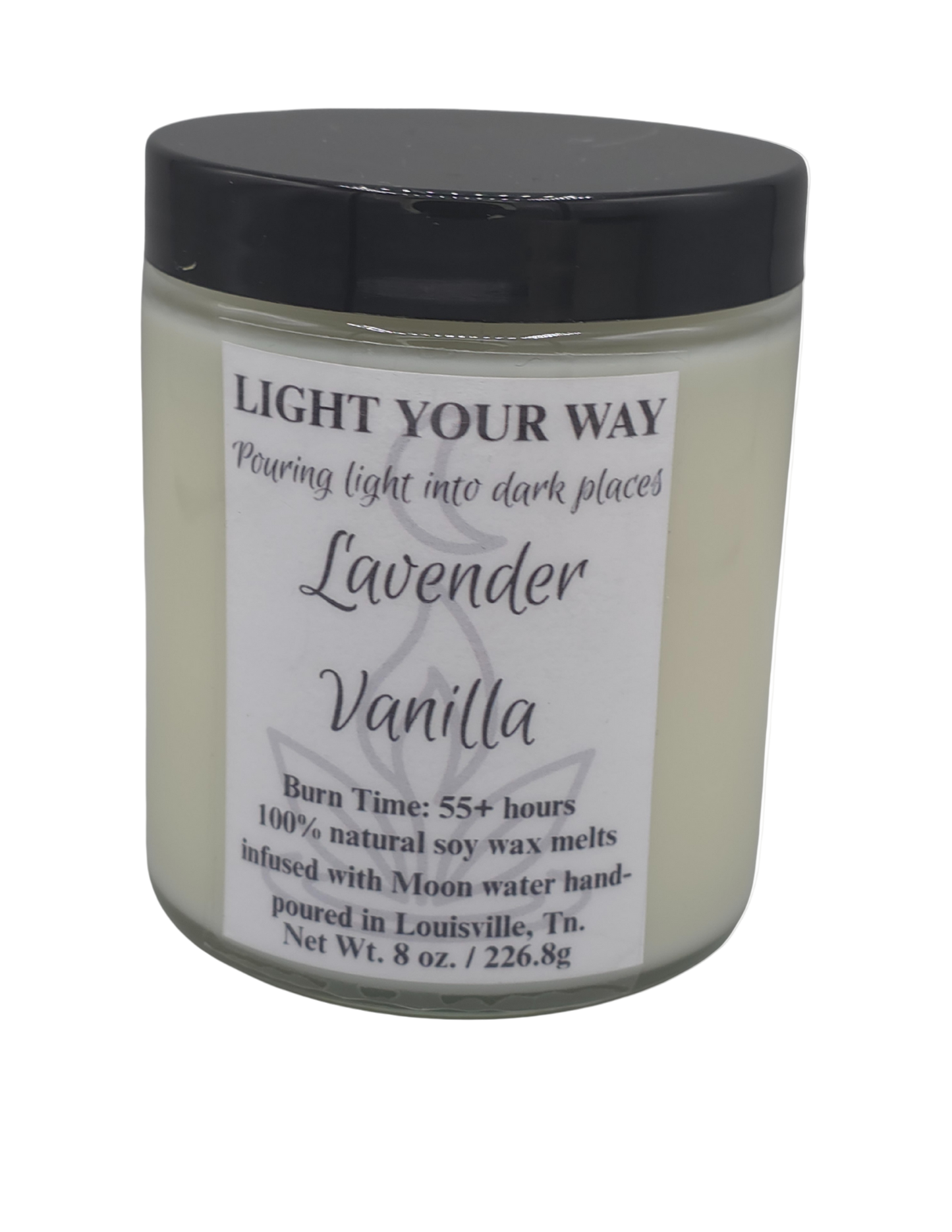 Candle jar with a label and black lid