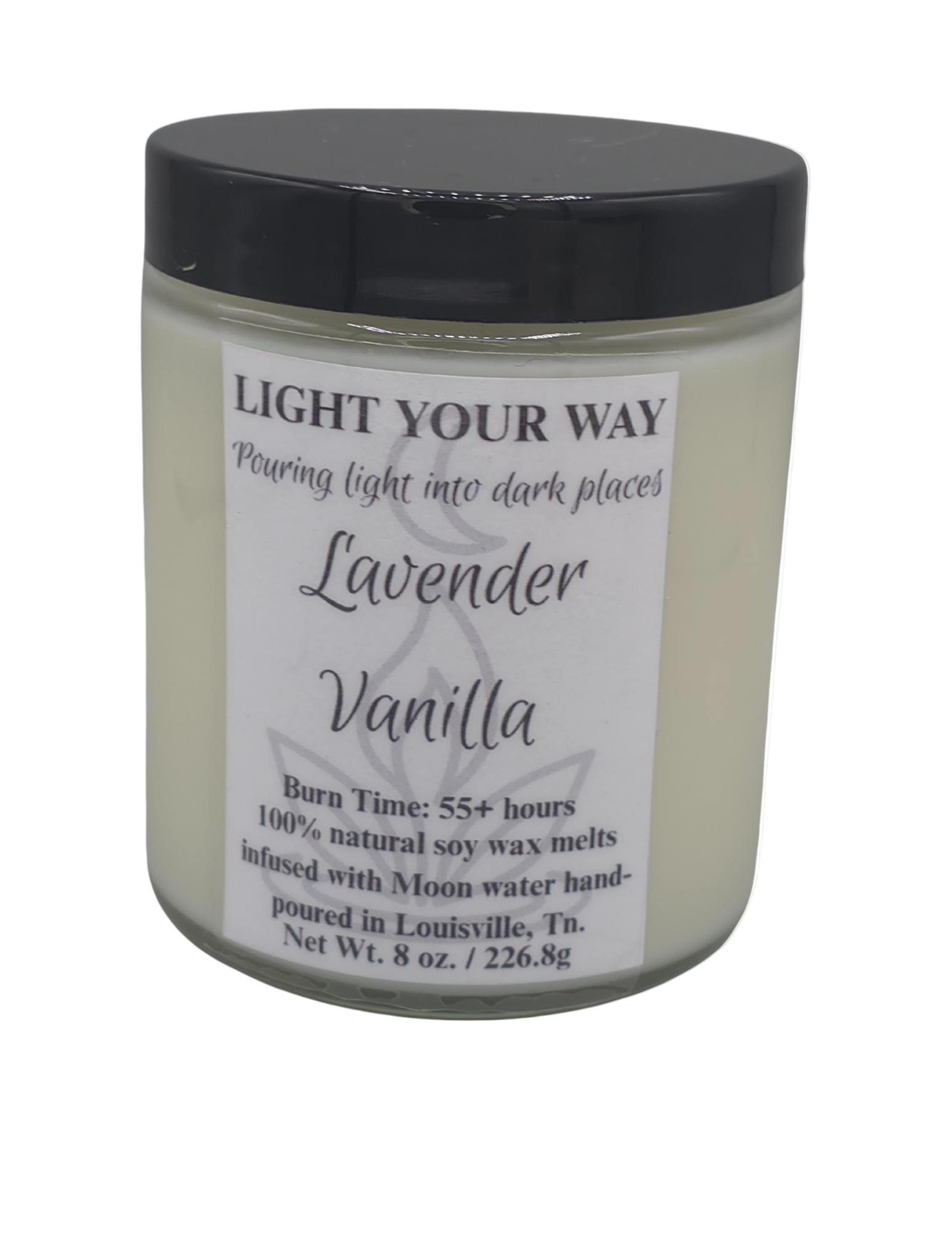 Candle jar with a label and black lid