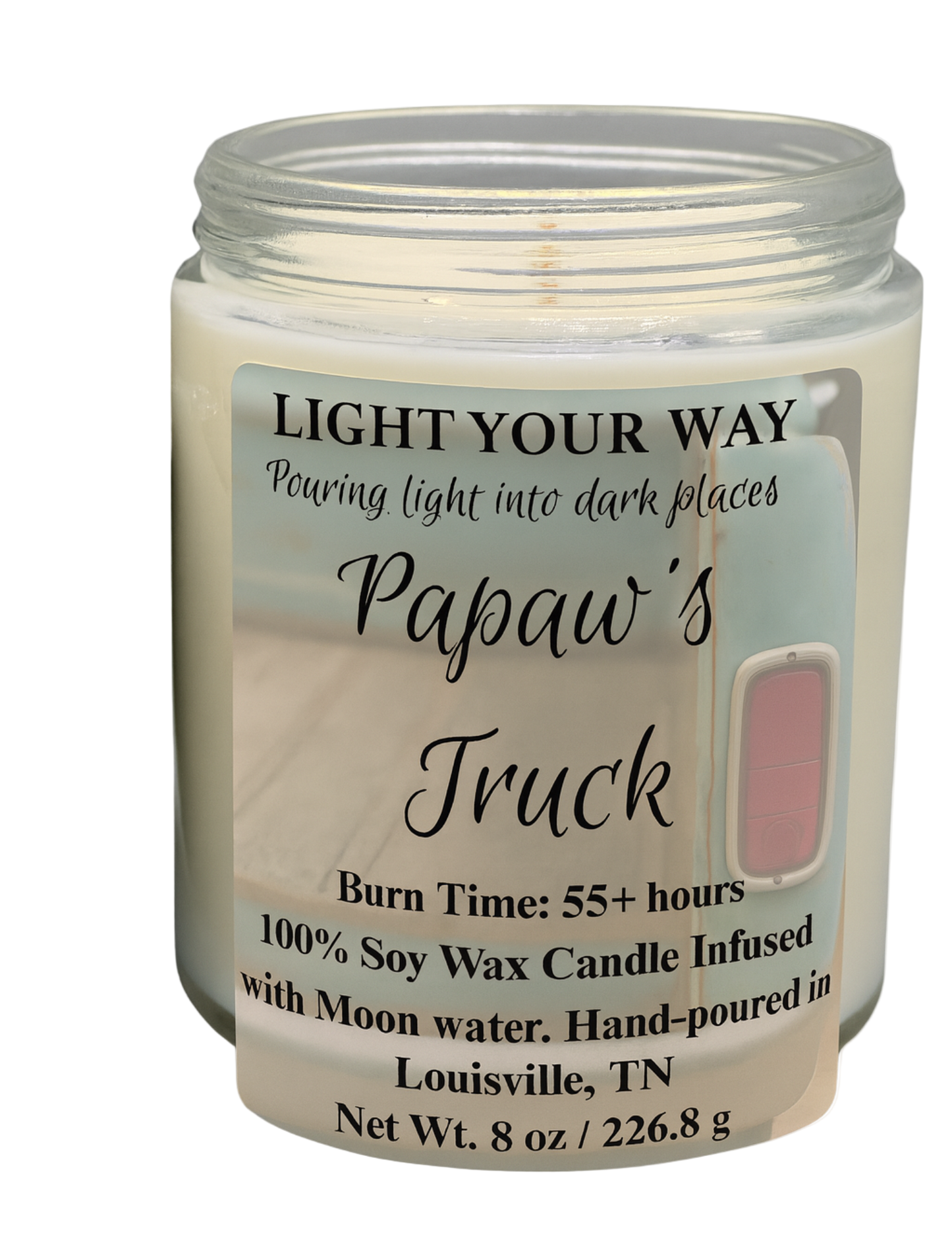 Candle with a label that says Papaw's Truck