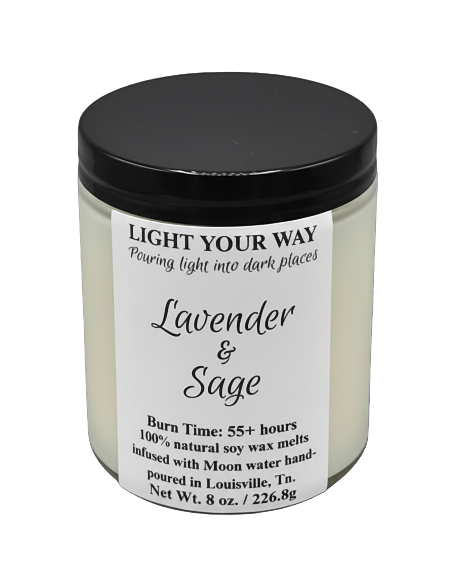 Candle jar labeled 'Light Your Way' with lavender and sage scent with a black lid