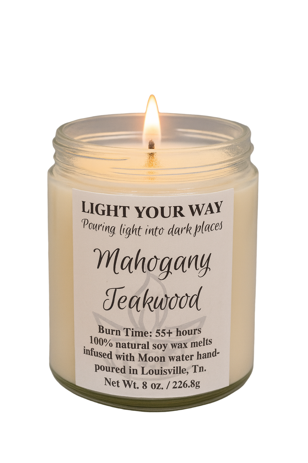 Candle in a glass jar with a label titled 'Mahogany Teakwood' 