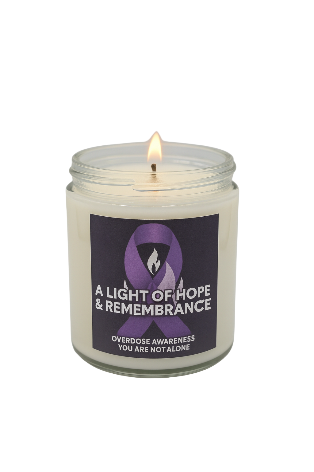 Candle in a glass jar with an overdose awareness label and flame